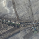 Imagen para el artículo titulado Esos puntos negros que se extienden en 64 kilómetros de carretera a Kiev son un convoy militar ruso